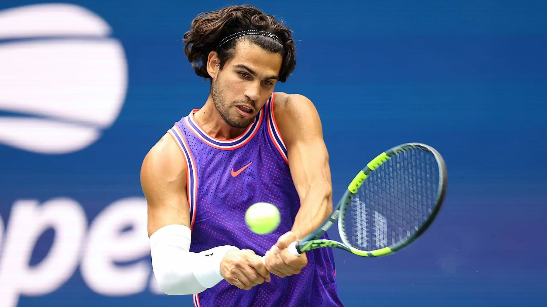 Carlos Alcaraz playing on a US Open hard court